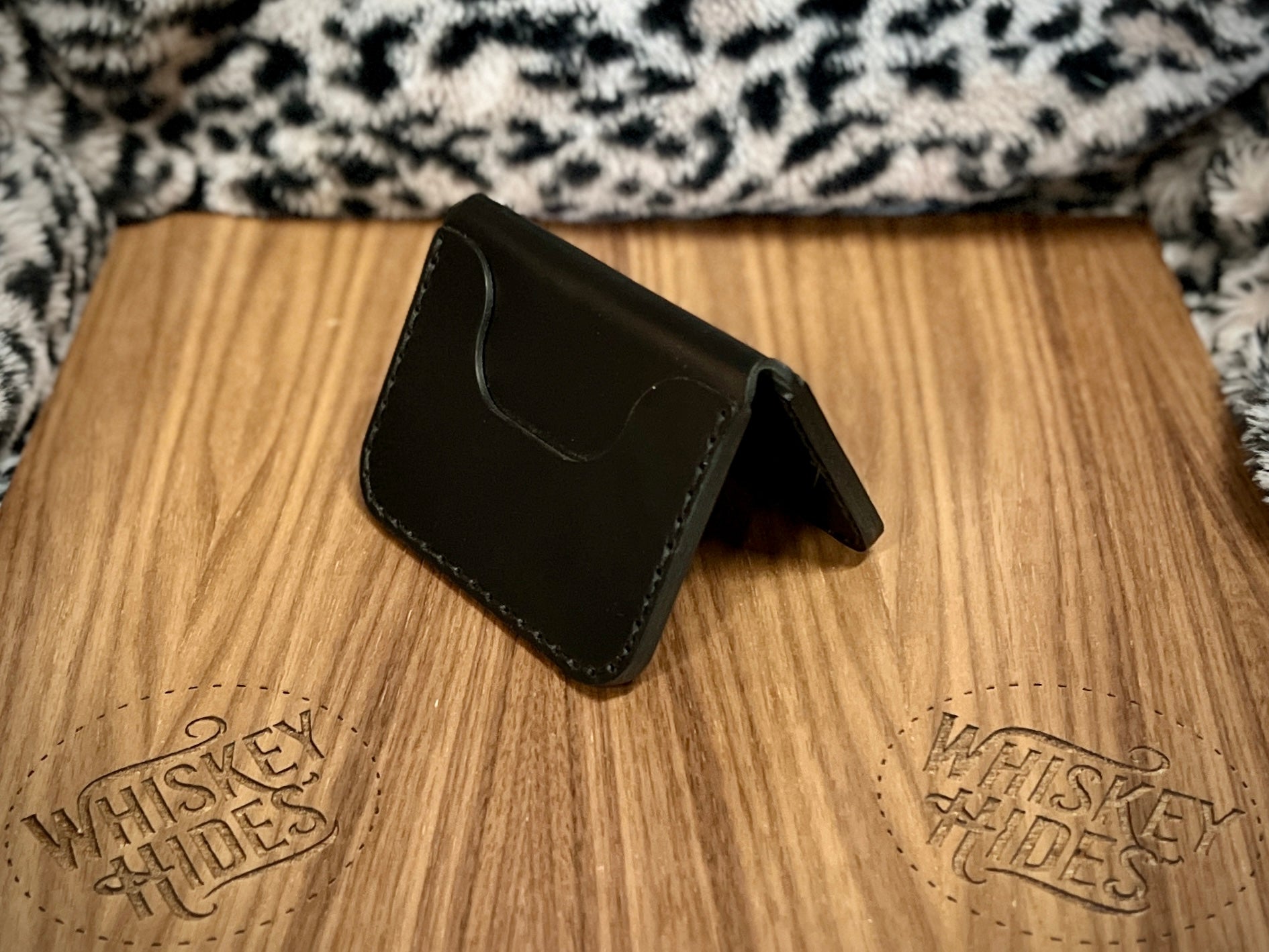 Minimalist Italian leather wallet in Charred Oak, exterior front view